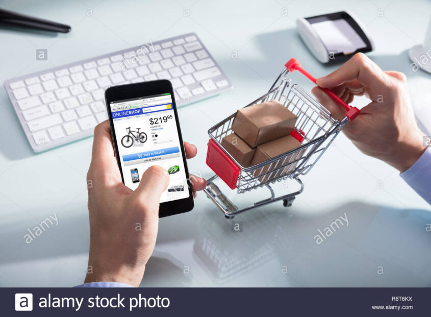 person-shopping-online-on-mobile-phone-R6T6KX